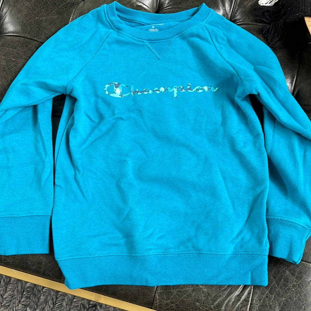 Bright blue kid’s champion sweatshirt